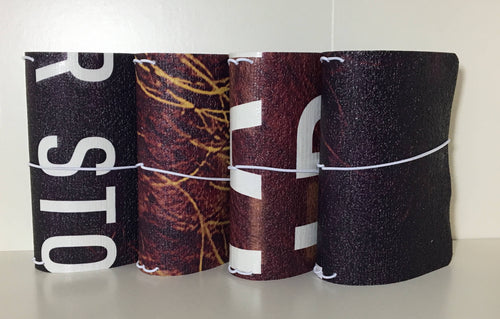 A6 size refillable notebook covers made from recycled vinyl billboards, signs and banners.