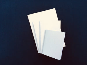 A7 Text Weight Blank Bound Notebook Insert with SuedeTex® Covers